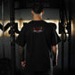 Polera Oversize PROTECT YOUR GAINS - Negro