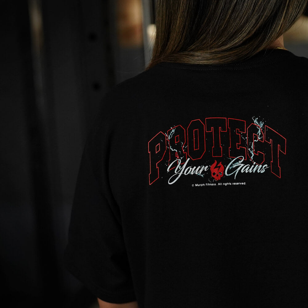 Polera Oversize PROTECT YOUR GAINS - Negro