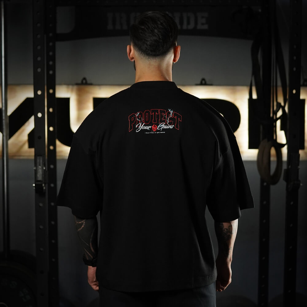 Polera Oversize ICON Premium PROTECT YOUR GAINS - Negro