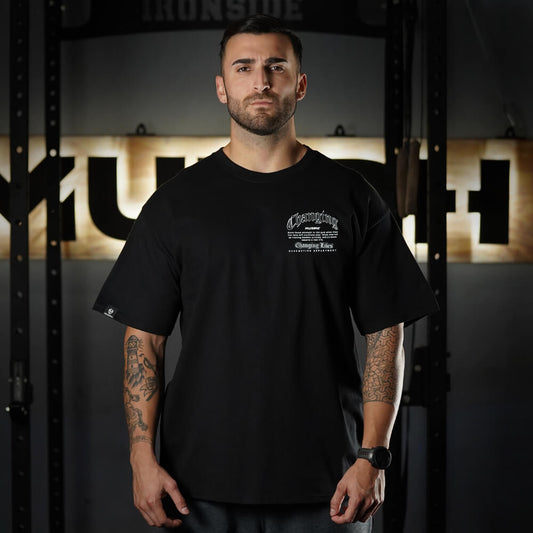 Polera Oversize CHANGING LIVES - Negro