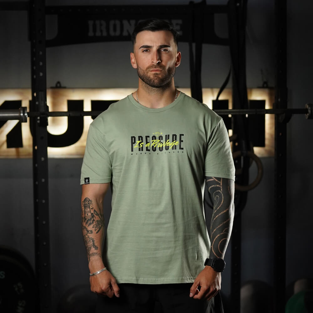 Polera Regular fit Pressure is a Privilege - Mossy