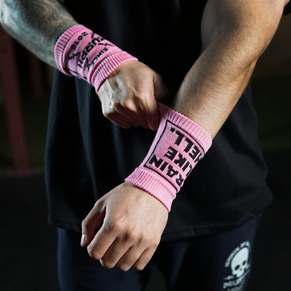 Wristbands Train Like Hell - Rosado